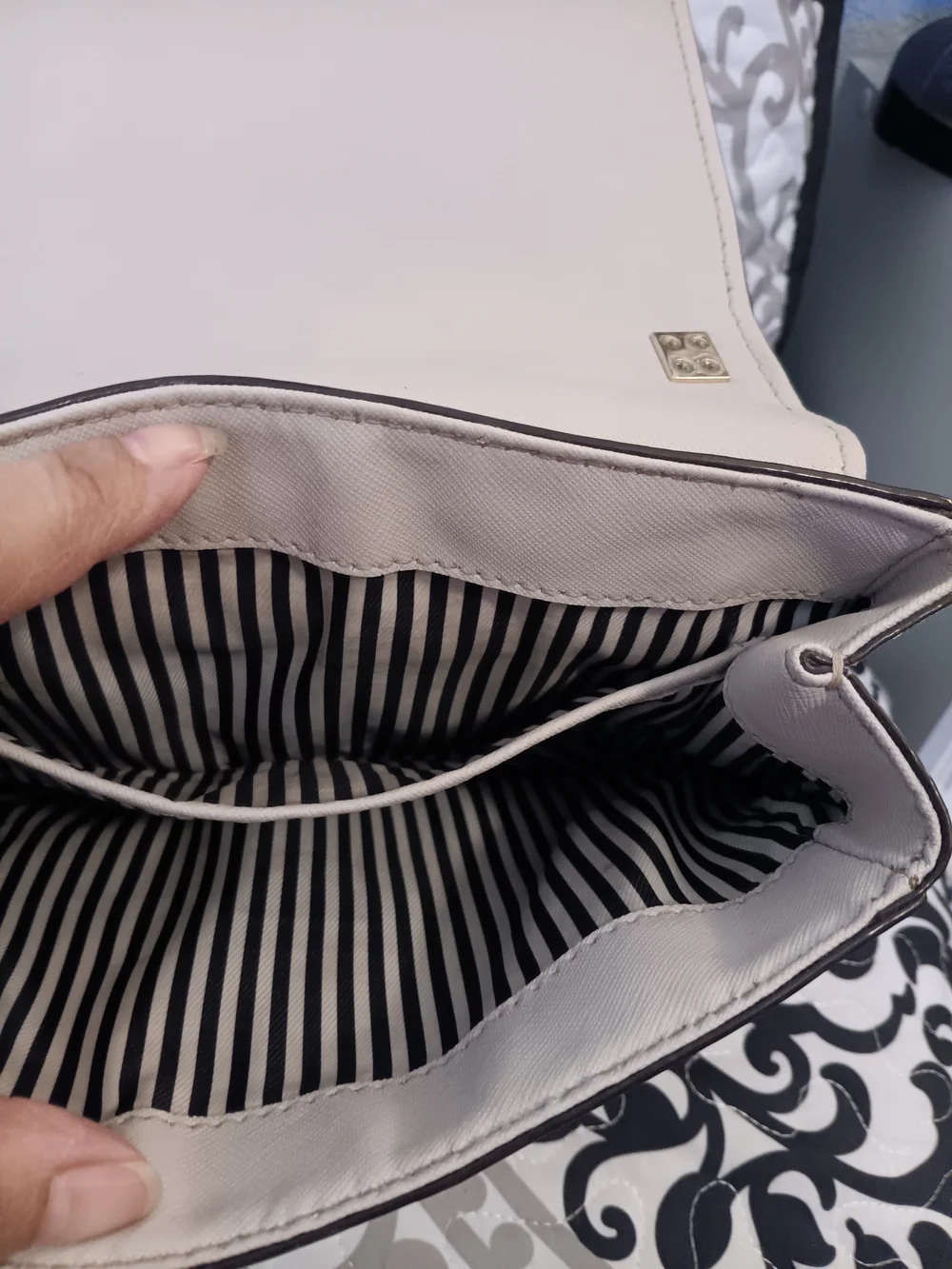 kate spade cream saddle crossbody with gold-tone logo
